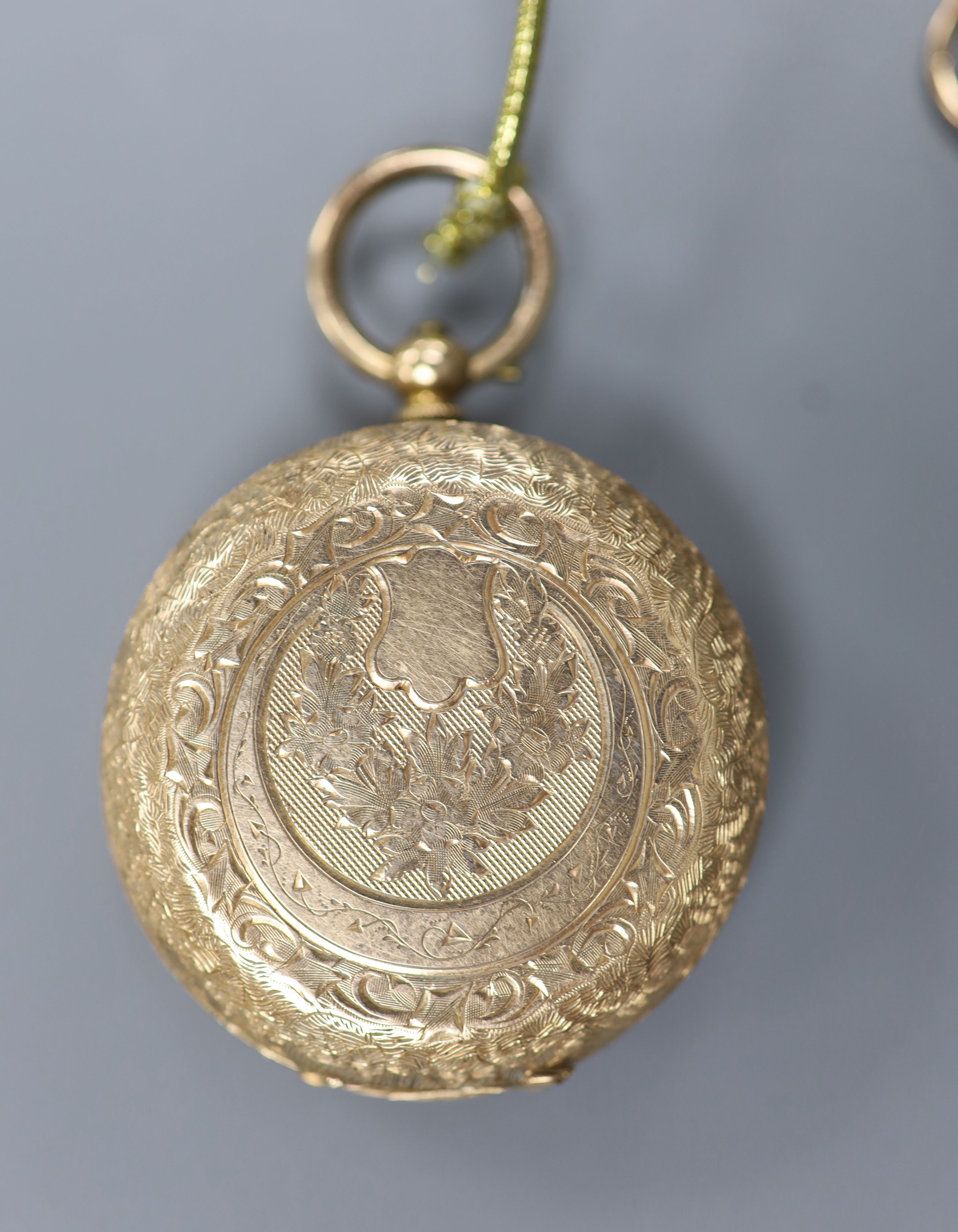 A lady's early 20th century continental 14k open faced pocket watch and a similar 9ct gold fob watch